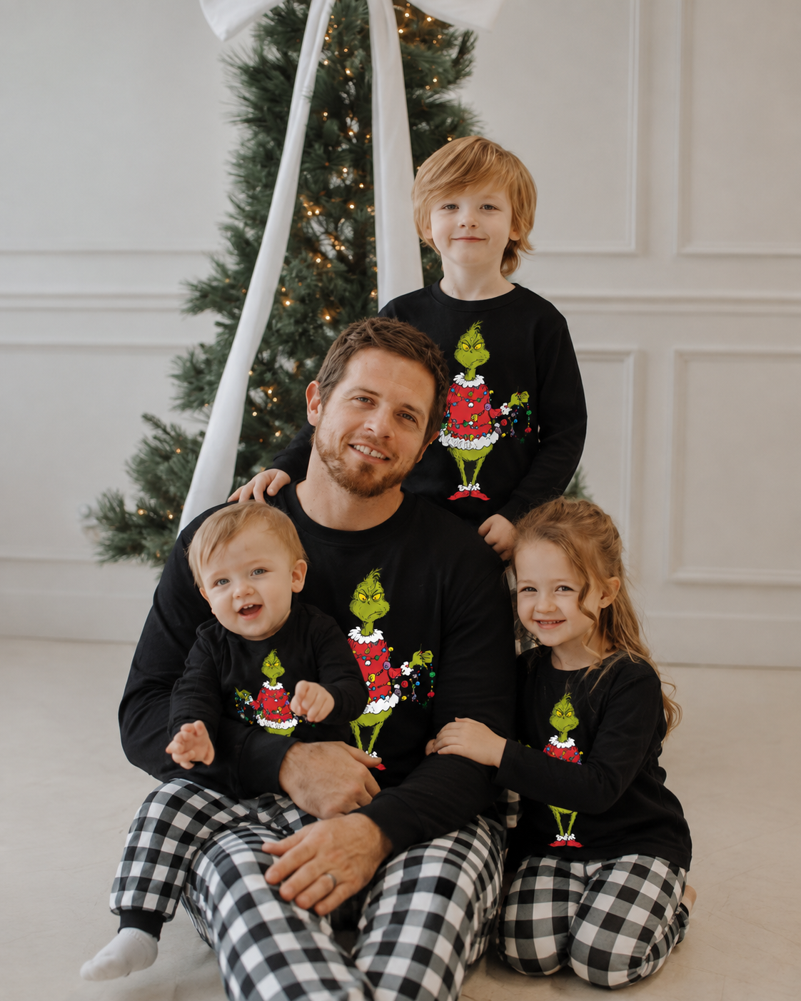 Holly Flag-Black and White Plaid Grinch Family Christmas Pajamas