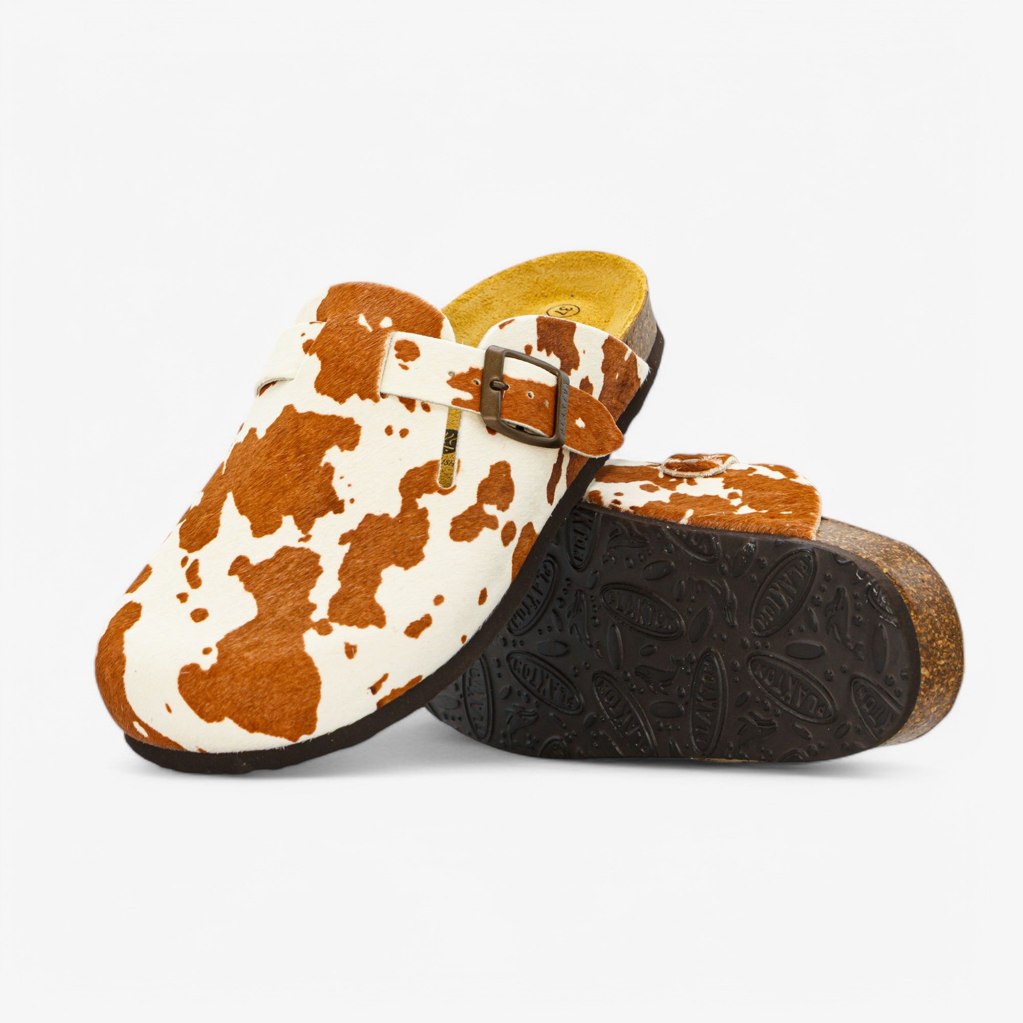 Cow Print Cuero Clog Shoes